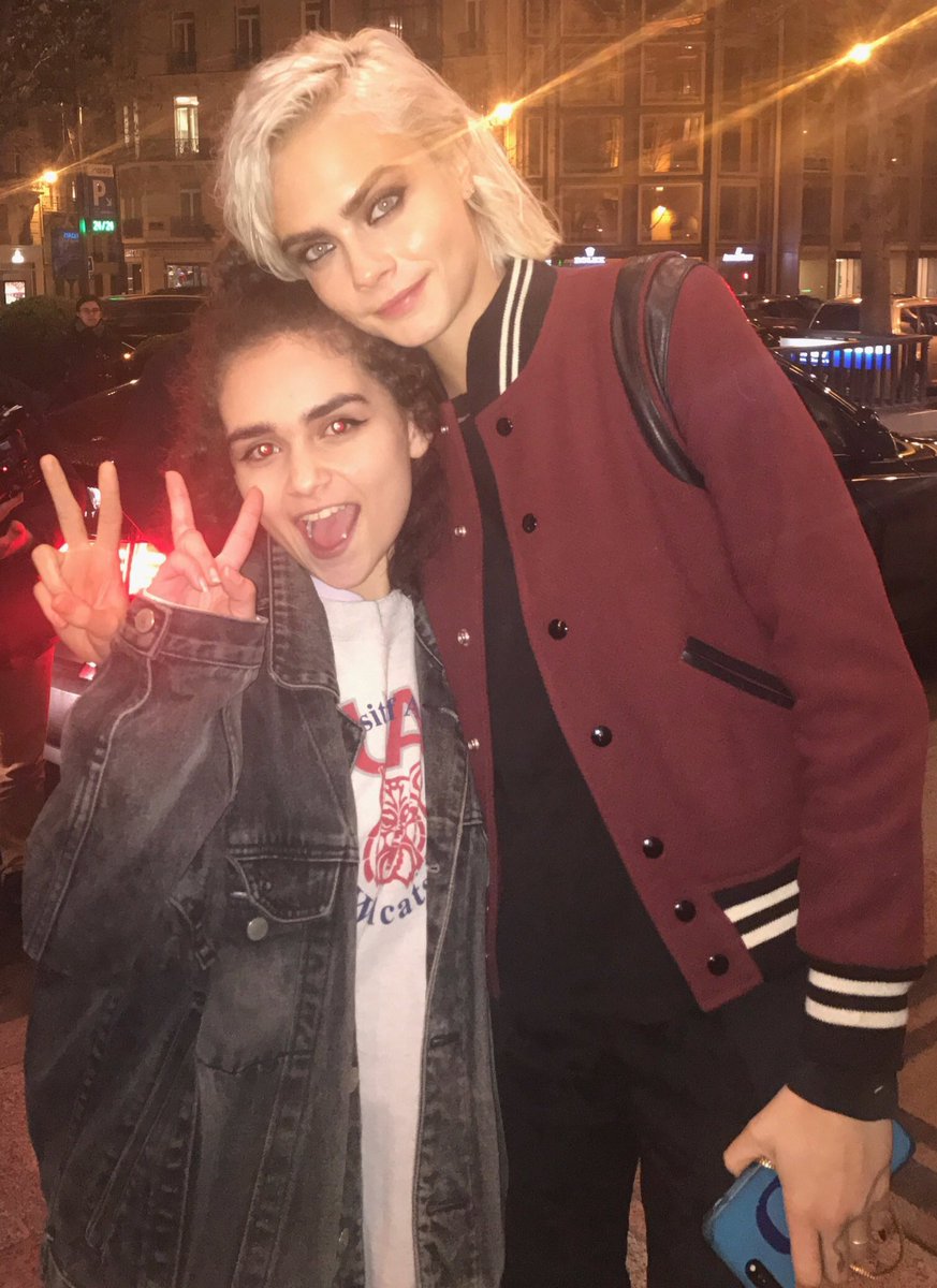 March 22: Cara Delevingne with a fan out in Paris.