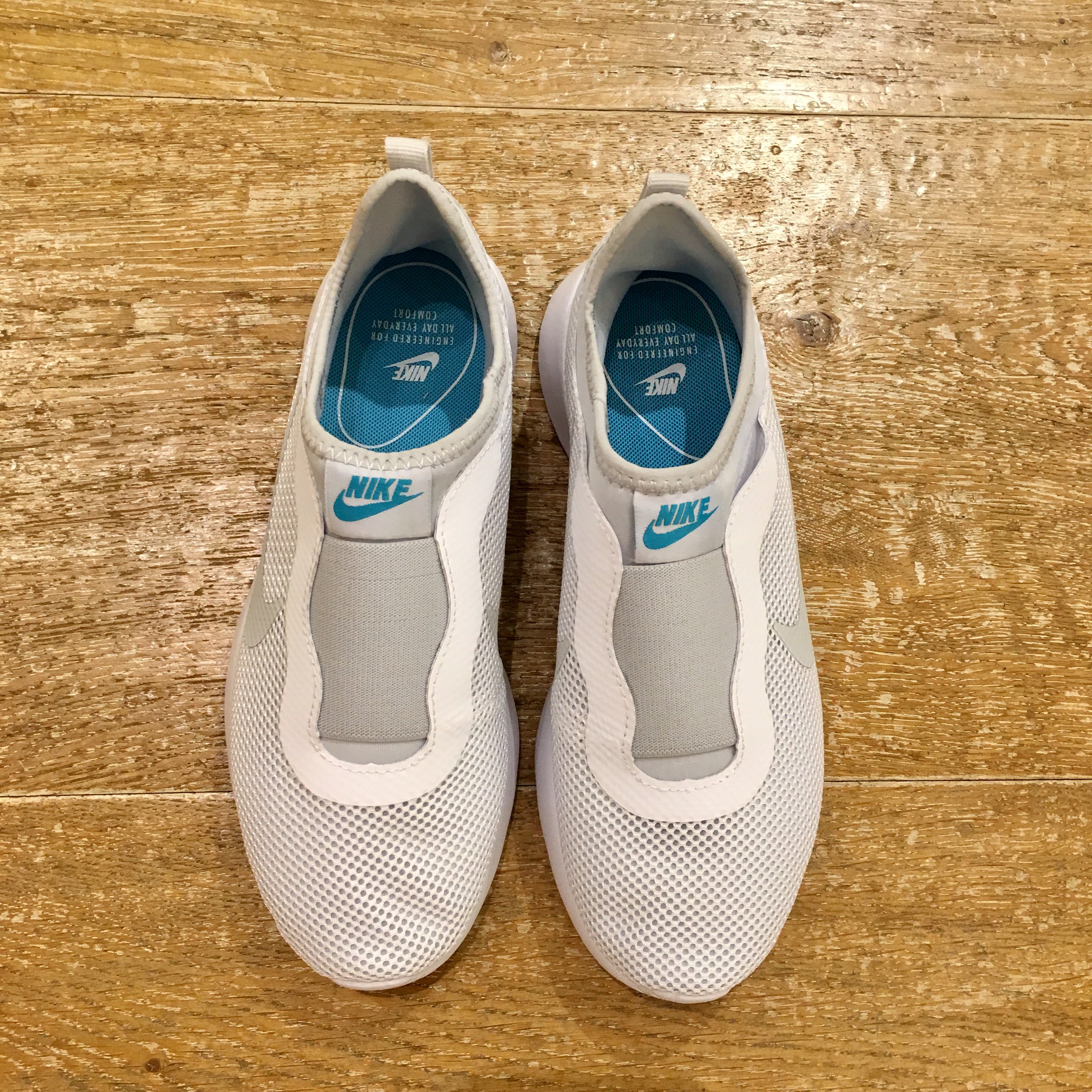 Nike wmns tanjun slip discount