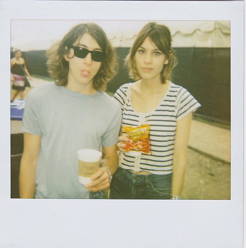 these polaroid pics of alex turner and alexa chung. why were they so cute :(