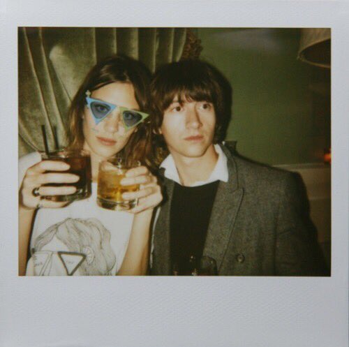 these polaroid pics of alex turner and alexa chung. why were they so cute :(