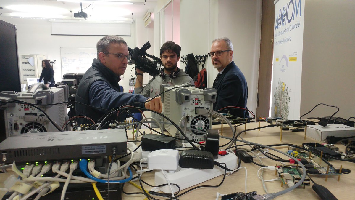 axiom_project's tweet photo. Hey, @RadioSienaTV has come to @unisiena to interview @robgiorgi and make an article on the #AXIOM Board. #Arduino #UltrascalePlus #HPC https://t.co/0vKryy8ZLn