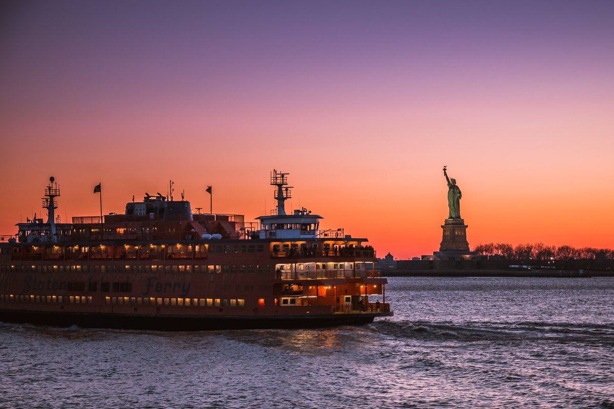 javanng's tweet image. States Island Ferry sailing by Statue of Liberty at dusk #NewYork #NikonLoveNY @StatueEllisNPS #travel @NikonUSA @NatGeoTravel @nyc