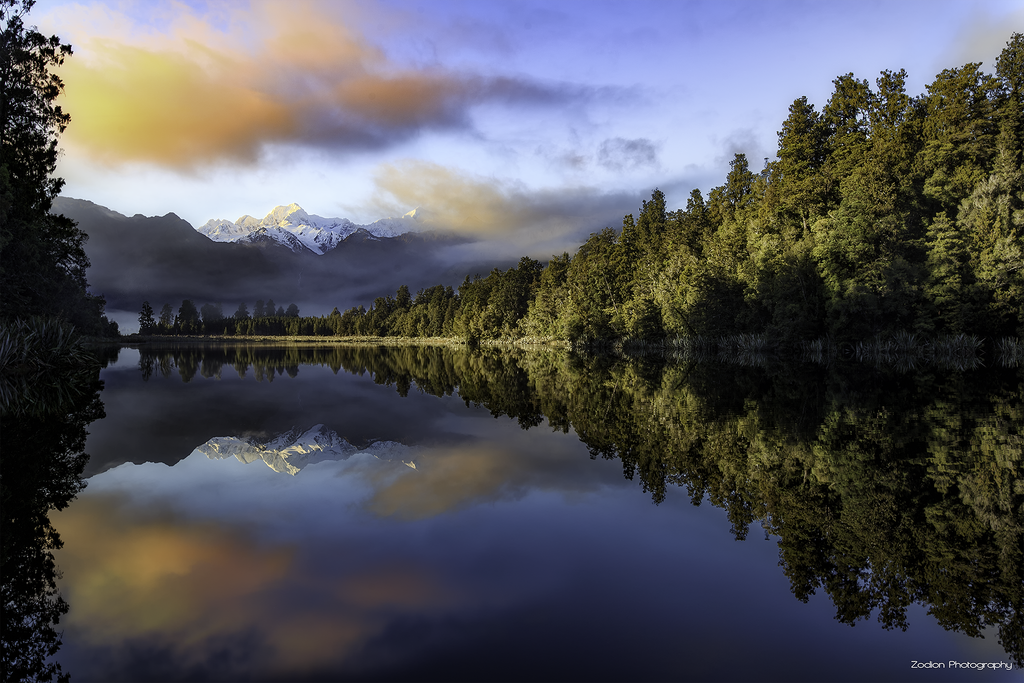 PhotoSnapping's tweet photo. Lake Matheson – New Zealand – [OC] [2048×1365] #reddit https://t.co/X6gPxDw2J6 https://t.co/4IKxnmNilh