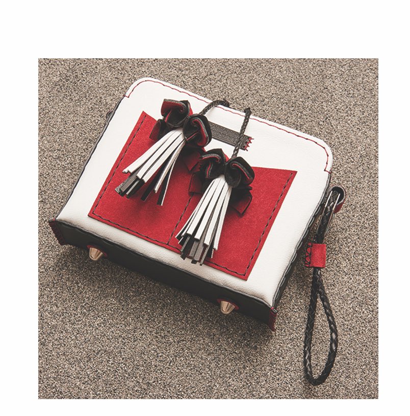 New season flower tassels hand stitched and crafted using traditional Japanese origami🌷 #bags #ss17 #flowers #britishfashion