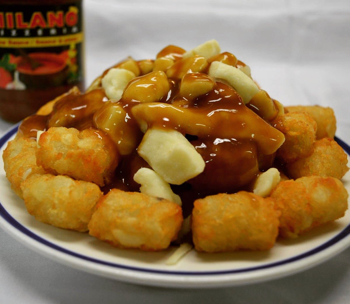 milanopizza1's tweet photo. #PomPomPoutine😍
With Tater Tots instead of Fries😋
#OhSoGood they're #todiefor online at https://t.co/lUN1zxDm2W 
#Ottawa #Poutine #Otteats https://t.co/ANJUfmUTF6
