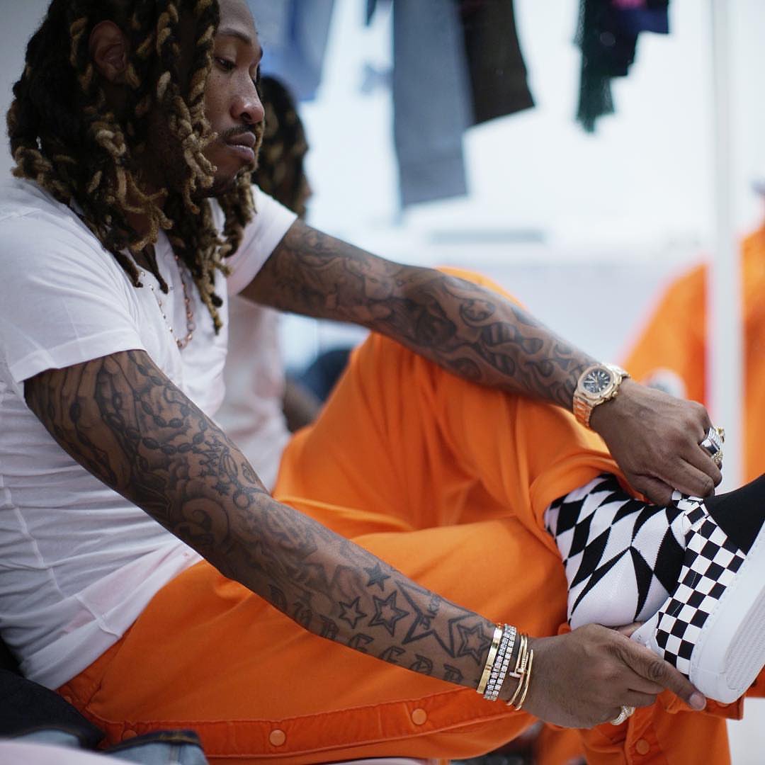 thesneakher's tweet photo. .@1future wears $660 @givenchy checkered slip-on trainers and #CollectionELA "Arch" anorak jacket and "Hendrix" tear-away pants. https://t.co/OnHgN3mIqH