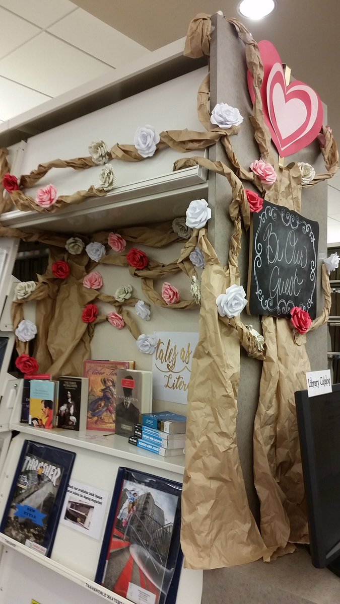 LibraryBlonde13's tweet image. My new library display with the beautiful paper roses I made!!! 🌹💖📚 #BeautyAndTheBeast #LibraryLife #LoveMyJob