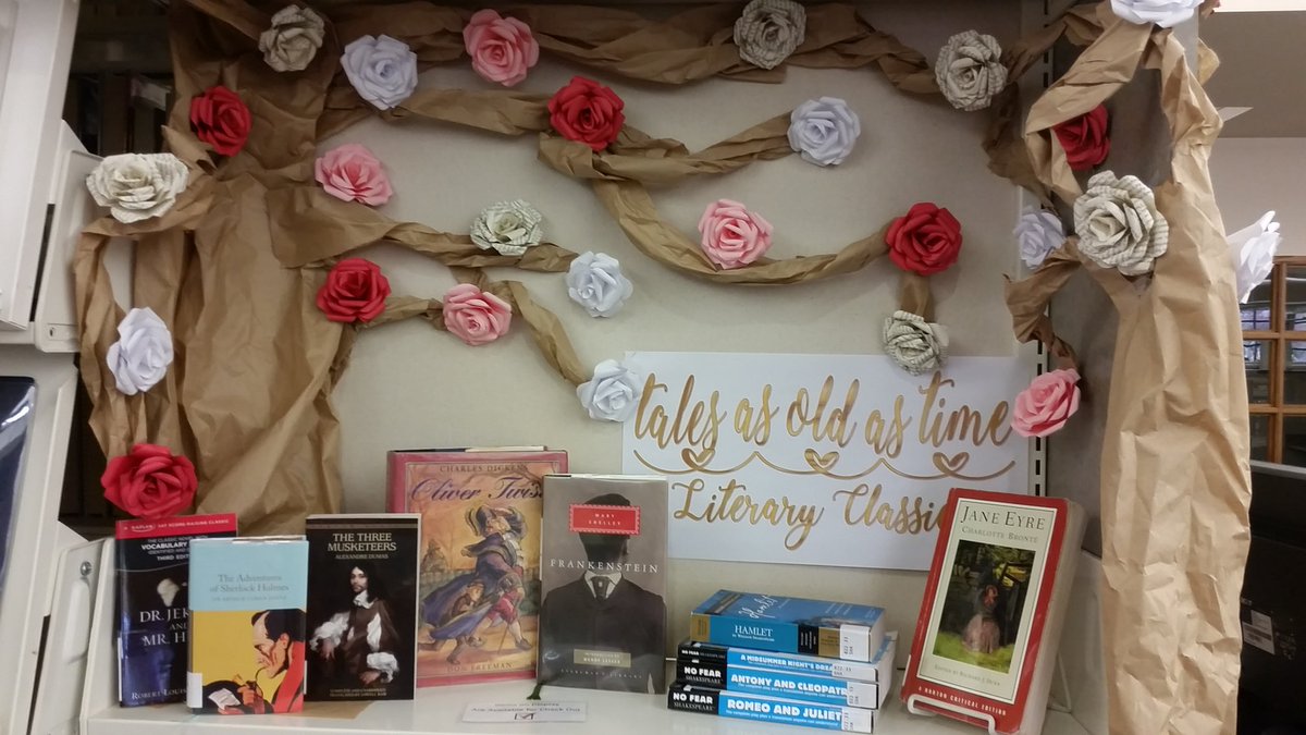 LibraryBlonde13's tweet image. My new library display with the beautiful paper roses I made!!! 🌹💖📚 #BeautyAndTheBeast #LibraryLife #LoveMyJob