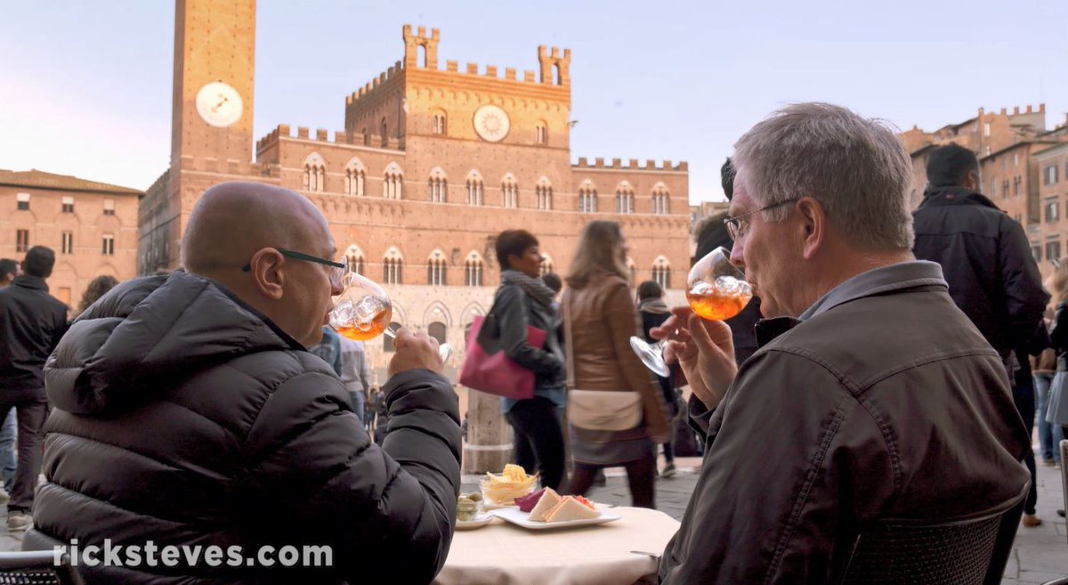 RickSteves's tweet photo. This week on my vodcast, I enjoy a scenic happy hour on Siena's Piazza del Campo with an aperitivo cocktail: https://t.co/T0OesHr4cf https://t.co/klRRLAF0X9
