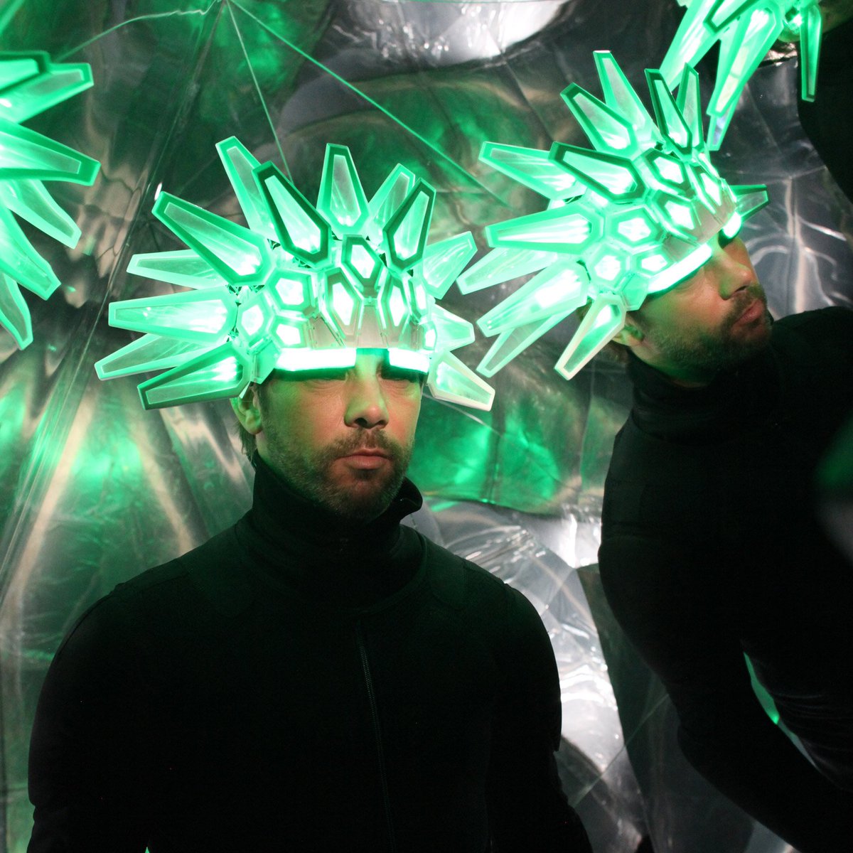 dezeen's tweet photo. Moritz Waldemeyer creates 3D-printed light-up helmet for Jamiroquai frontman: https://t.co/AOQrNQPJiL https://t.co/ItxUuIgmG6
