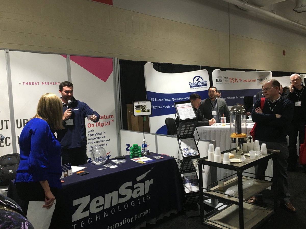 Zensar's tweet photo. Zensar’s Chris Potter helps to draw our Dash for Prizes today @SecureWorldExpo Boston #SWBOS17 #digitalsecurity https://t.co/WlGmENGQM3