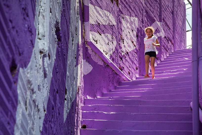 designboom's tweet photo. boa mistura gives a favela a multicolor metamorphosis with anamorphic alleyways #streetart https://t.co/kj4MhxG0b6 https://t.co/Ylv29ITgd9