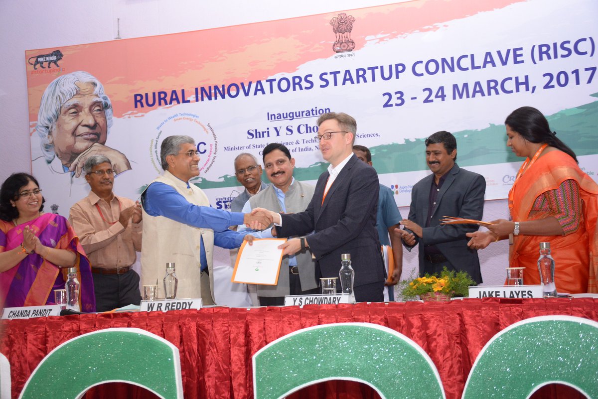 Dr. W.R. Reddy, IAS, Director General NIRDPR, Hyderabad, is seen felicitating Mr Jake Layes.