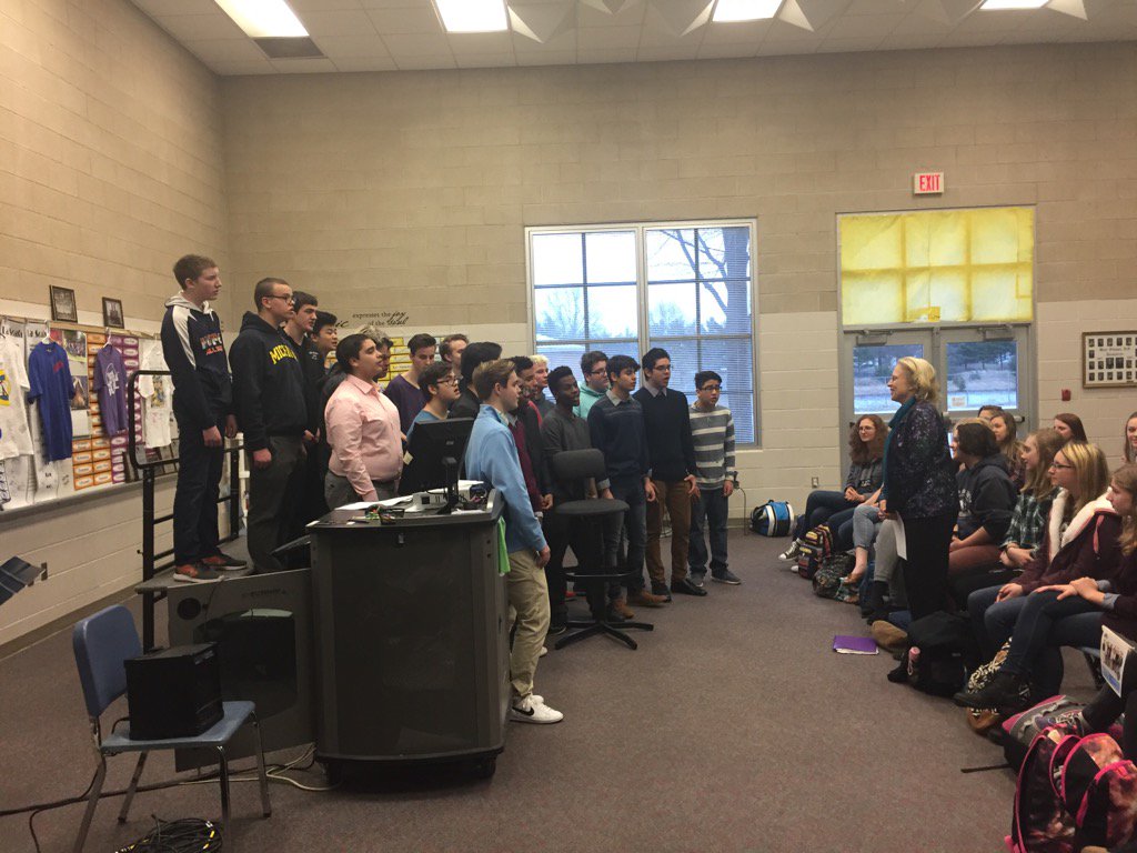 Pam Pierson with the men's choir that nominated her for Classroom of the Week on Fox news