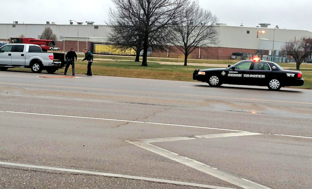 NSP_TroopC's tweet photo. Apparently, when you are in a hurry to help someone clean up their spilled lumber, you don't have time to put your hat on. #Trooperproblems https://t.co/9S2bUk6DPn