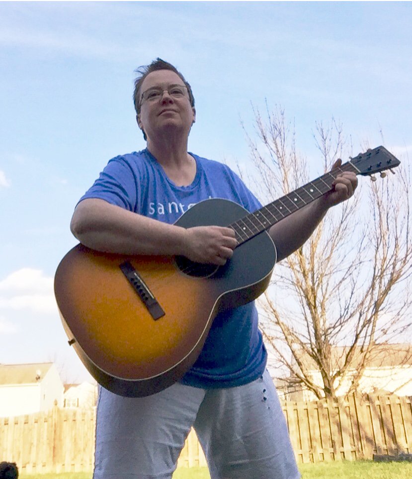 dogmother's tweet photo. Enjoying my new Martin 00-17S on this beautiful sunny day.  Thanks Mark!  #guitarhotline  #martinguitars https://t.co/4W8YjoDnvw