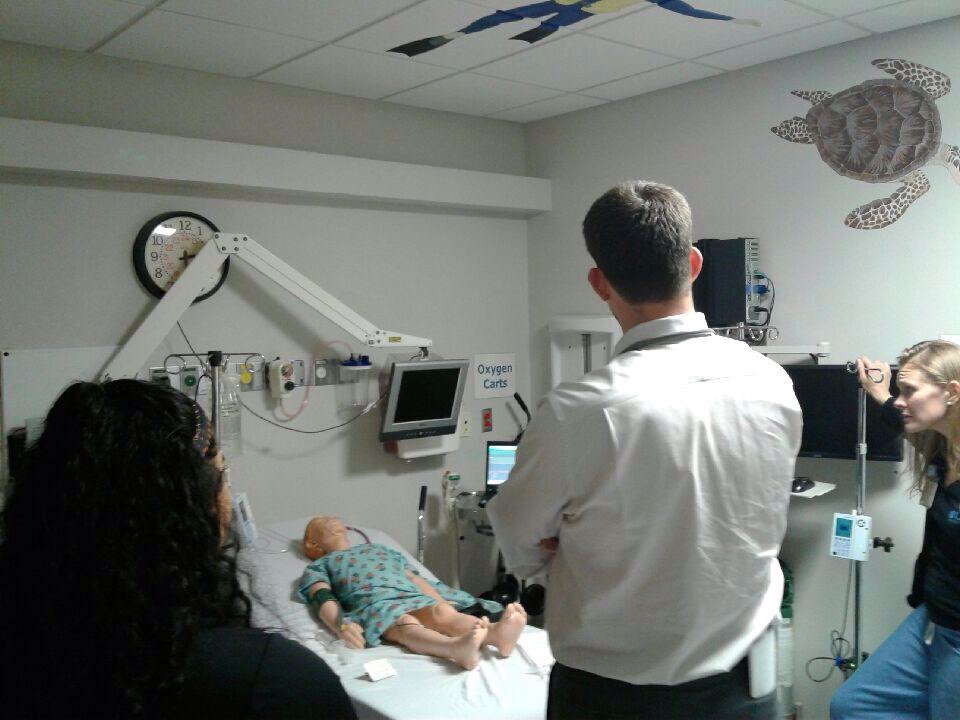 UNCsim's tweet image. Debriefing the #interprofessional #CodeSepsis. Excellent communication on this #UNCsim team