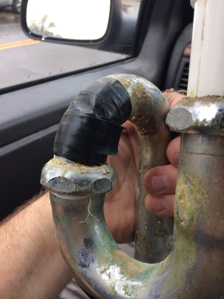 weissinnovation's tweet photo. Apparently electrical tape can be used to repair sink drains. Who knows how long it was like this. #handyman #plumber https://t.co/Z6an5MPear