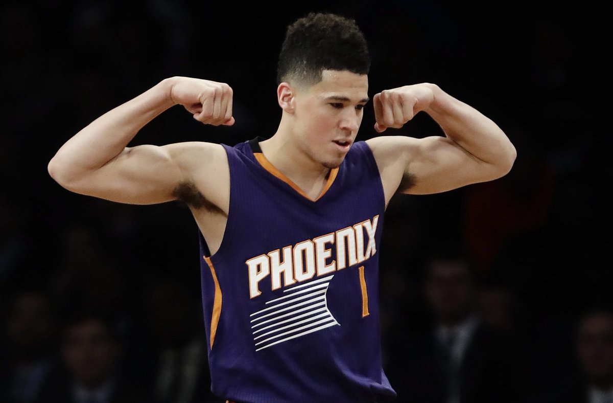 SportsCentre's tweet photo. BREAKING: Suns SG Devin Booker scores a franchise-record 70 points, but Phoenix loses to the Celtics 130-120. #NBA https://t.co/UGq8HR5DO8 https://t.co/epoPXdbUwp