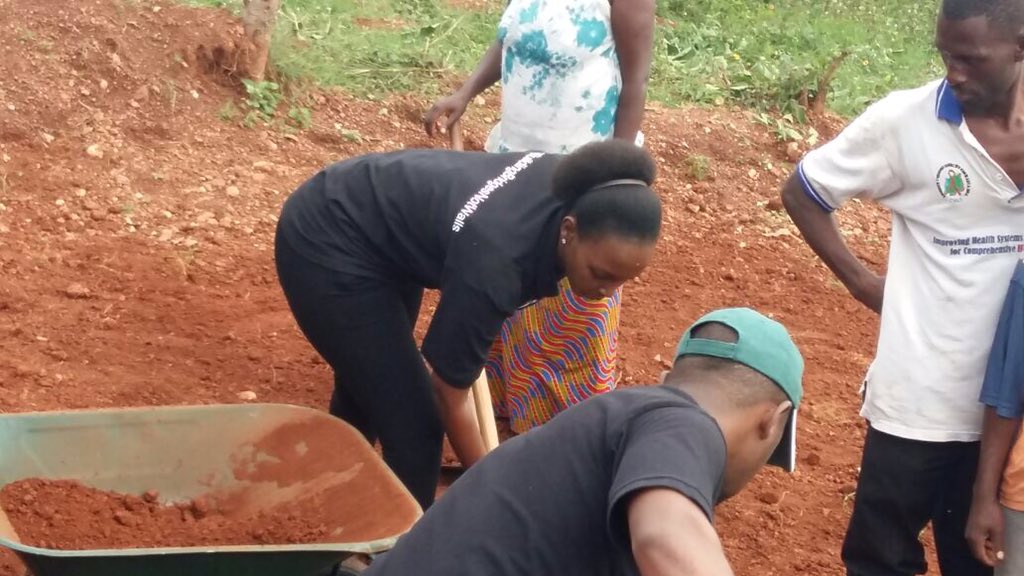 Yumutoni's tweet photo. IHSRwanda involved in major site clean up and drainage system creation at Rebero Karambo cell #Umuganda #community #beyondthetower https://t.co/nm4RBSvEMr