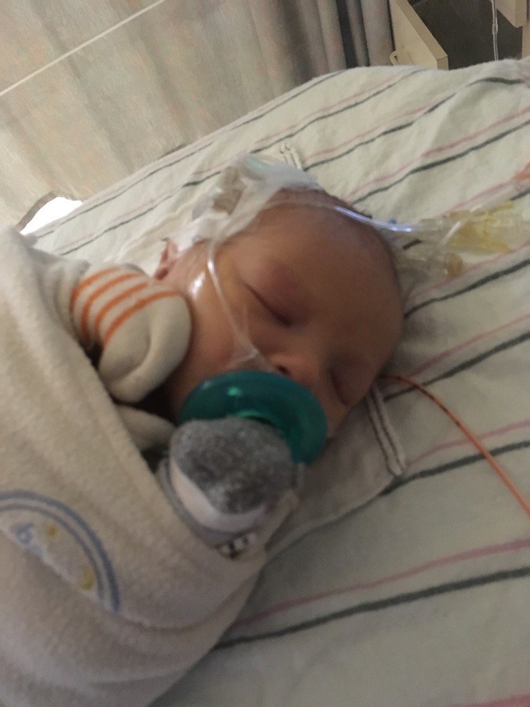 TroyDavis16's tweet photo. Little Eli finally getting to eat at 3:00 am this morning. Baby and mom getting better every minute. https://t.co/EXOAFSEUxX