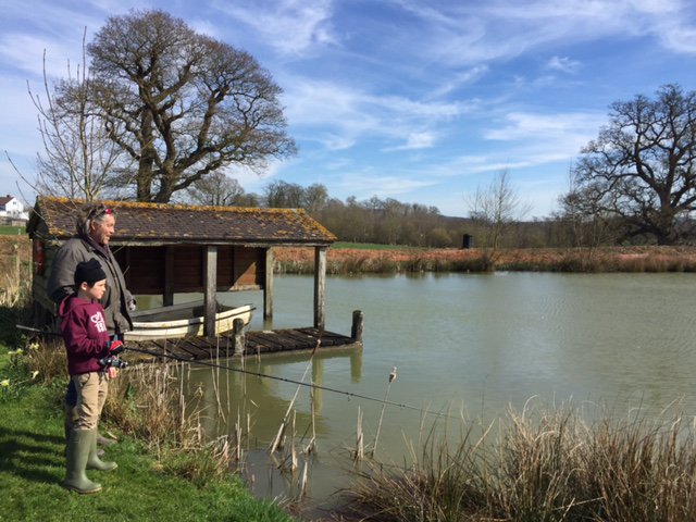 lighthousefrome's tweet image. The sun is shining @lighthousefrome today, and local father and son, Dean and Freddy, have come to check out the activity in the lake.