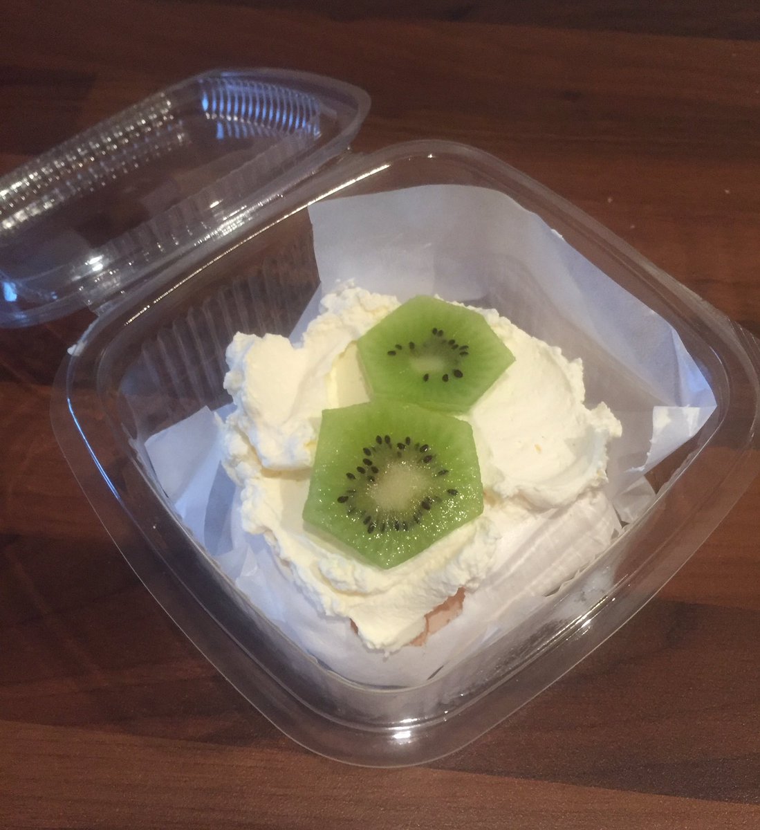 TeaByChatterbox's tweet photo. Individual portions of pavlova topped with fresh cream and fruit! Perfect treat anytime of the day #strawberry #peach #kiwi #orange https://t.co/3Liar4lVmf