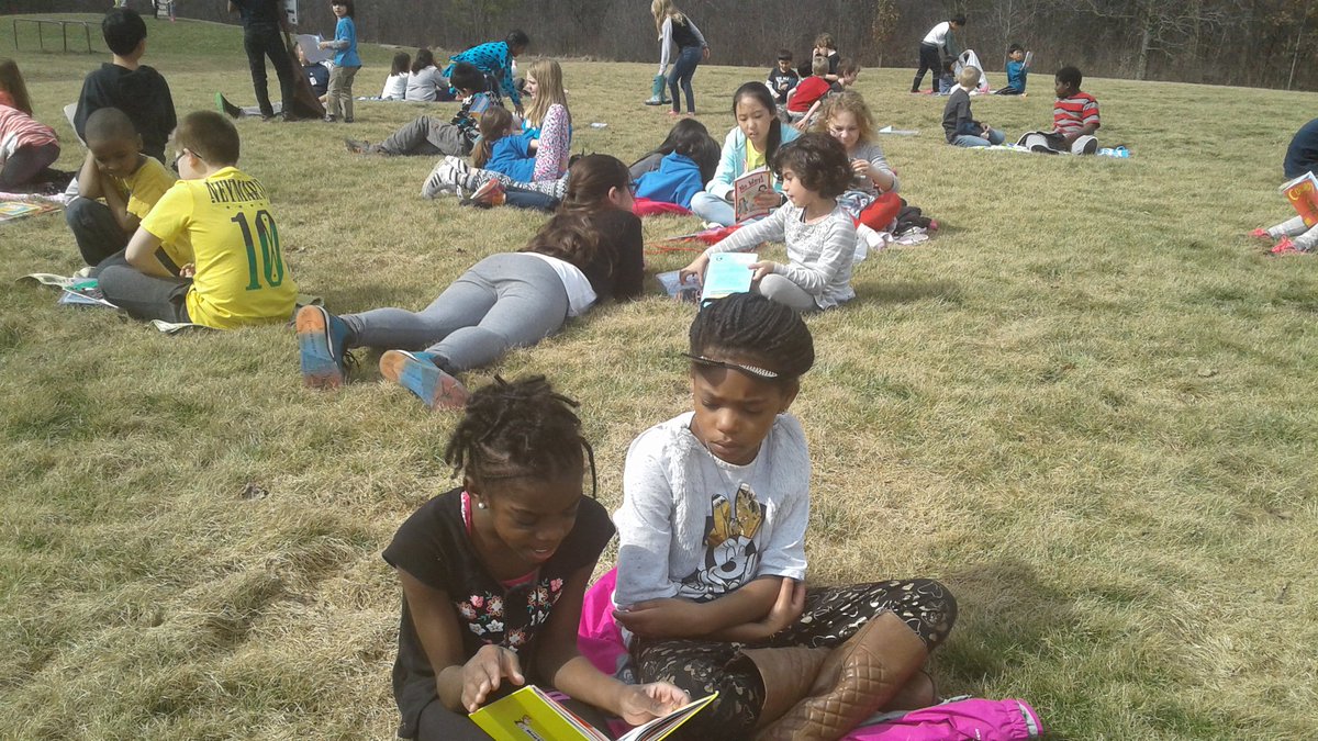4thThurston's tweet photo. What could be more perfect than celebrating March Reading Month outside on a beach blanket with your reading buddies? @a2Thurston https://t.co/sKZIM3siv4