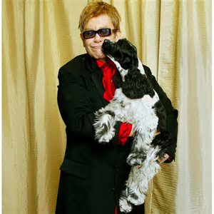 Happy 70th Birthday to Elton John! (Here with his dog Arthur) 