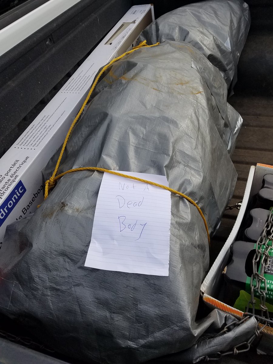 JamesFoxIsHere's tweet photo. How to make sure no one steals luggage out of the back of your truck. #seemslegit https://t.co/y6l2wmwEcJ