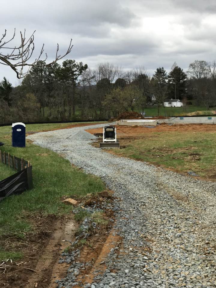 Hero_Homes's tweet photo. Thanks to the incredible support from Luck Stone and Heritage Site Development we got the driveway base complete for the Davenport HeroHome. https://t.co/dQmY3snLLK