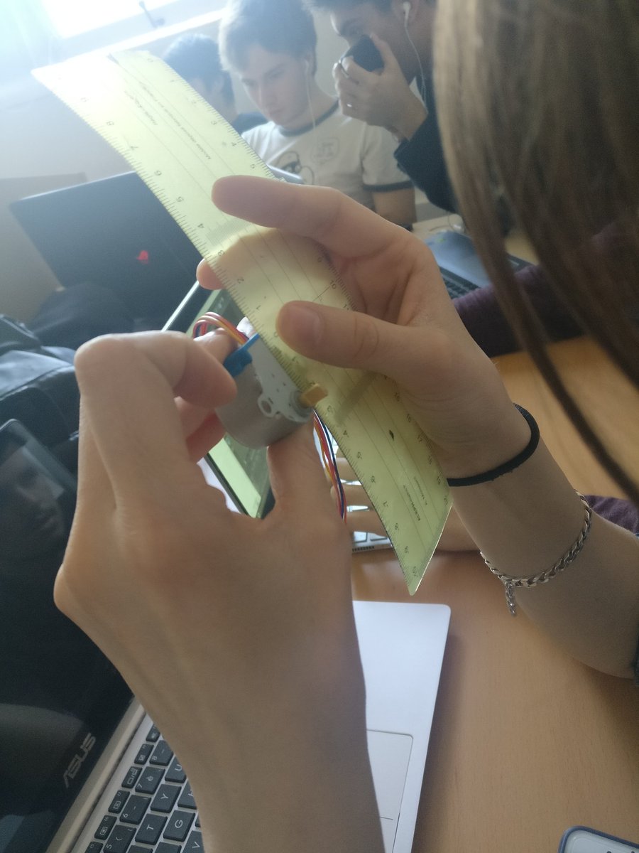 BrailleClock's tweet photo. Aurel the handywoman again! This time, measuring the dimensions of the stepper motor 💁 https://t.co/pIdpXJ0I5q