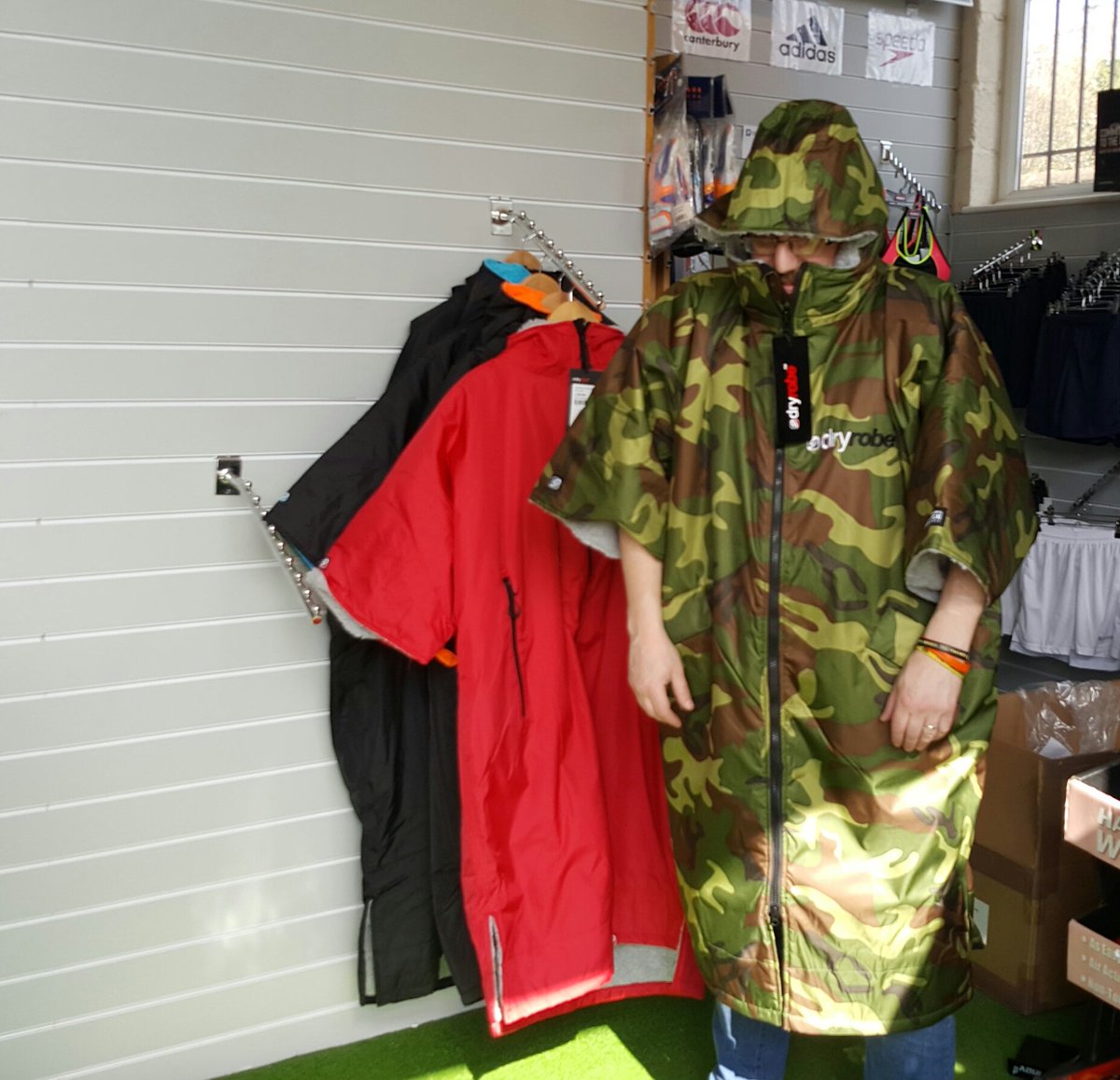 Our Manager has vanished while merchandising the <a href="/dryrobe/">dryrobe</a> range. Anyone seen him? #dryrobe #camo #ocr #getchangedstaywarm
