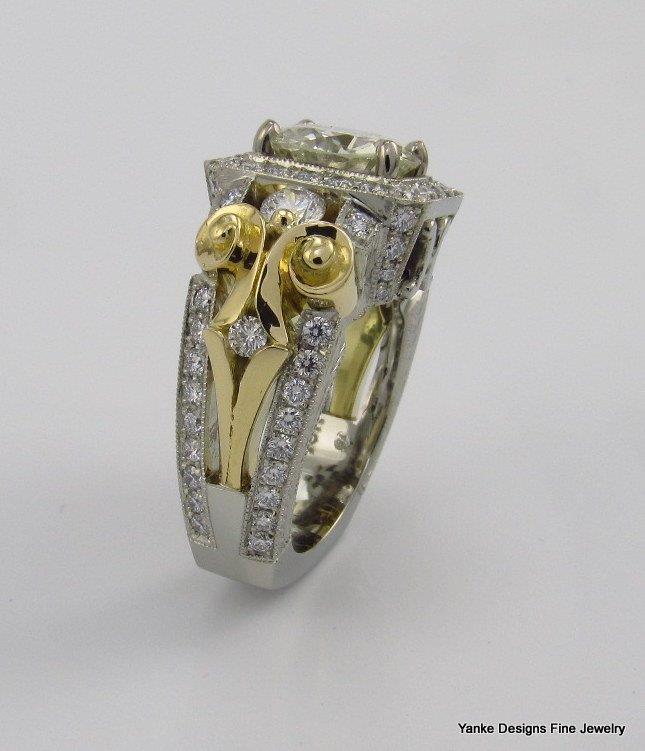 YankeDesigns's tweet image. Ladies 18kt white and yellow gold custom ring with 2.51ct  round major Diamond and 1.28ct total weight in smaller Diamonds.