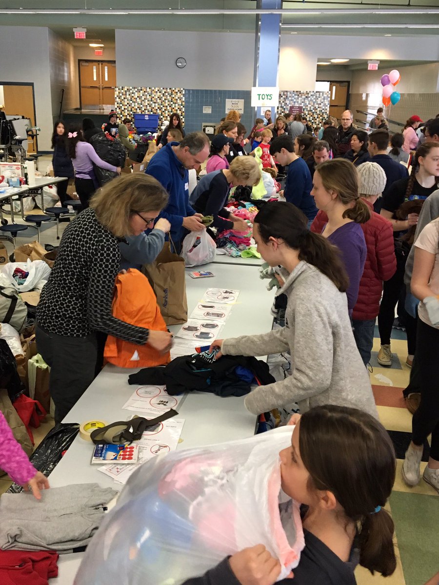 Today, dozens of Needham families come together at Needham High to support Cradles to Crayons!