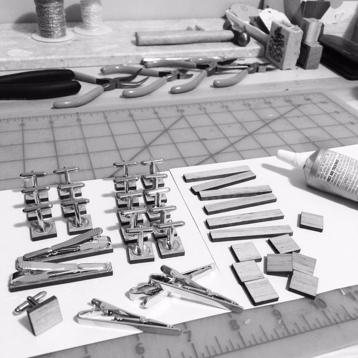 EternalBirdCo's tweet photo. Sanding, sealing, and gluing these blue pine wood cufflinks &amp; tie clips for some wedding orders 🥂 https://t.co/MGshU9F0oL