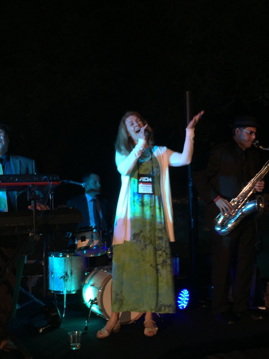 FEDAASSN's tweet photo. Karin Stern, wife of Chris from Vulcan, joins the band @ the closing reception @ the #FEDA2017 Convention.See you next year in Palm Springs! https://t.co/zZTcjpBiZU