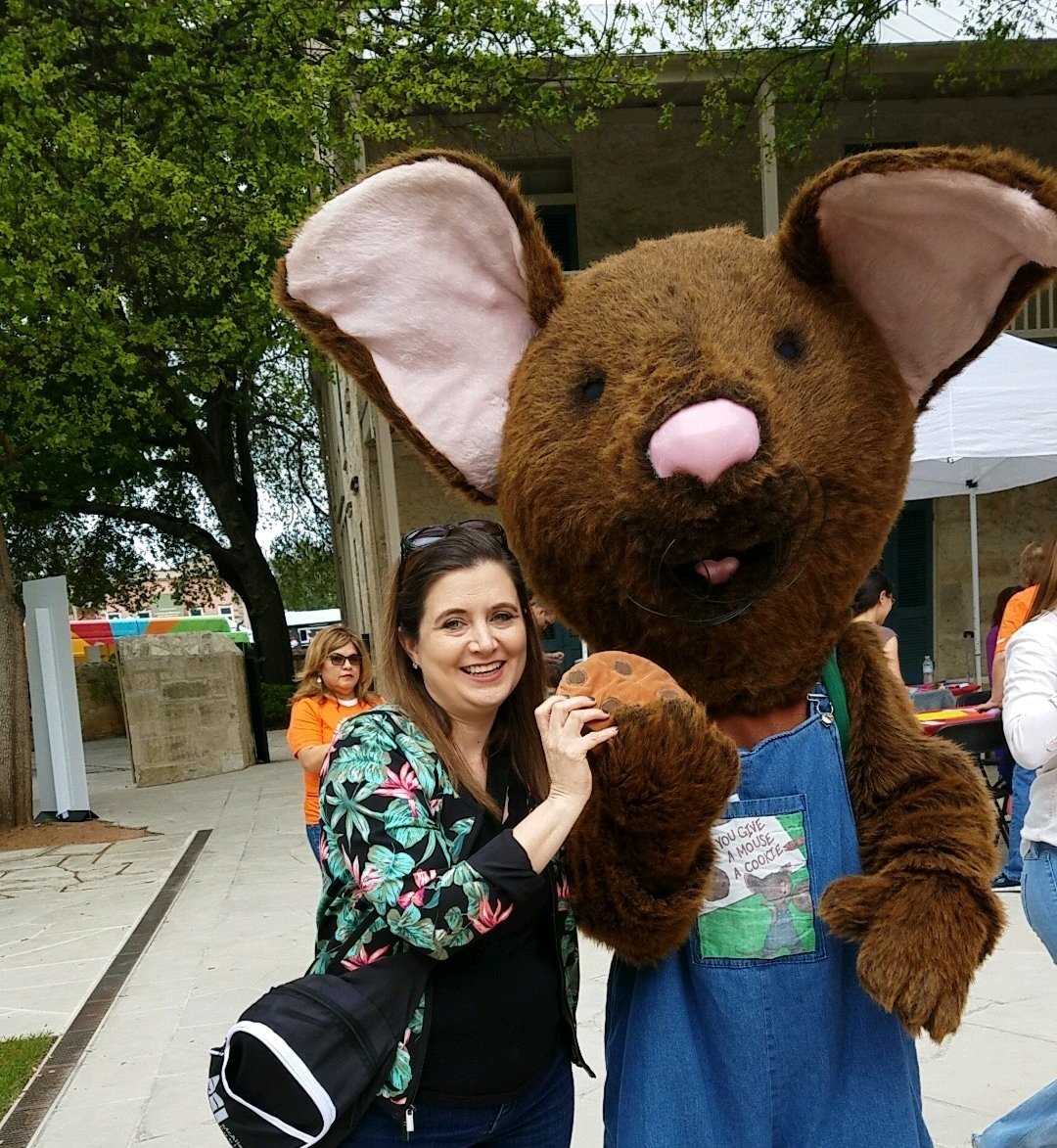 Enjoying a cookie at the #sanantoniobookfestival.