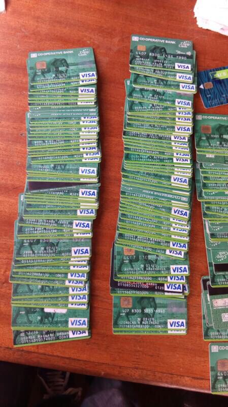 The man who was found with these is not a fraudster. Kenyans leave him with ATM cards and PINs to pay himself after borrowing loans from him