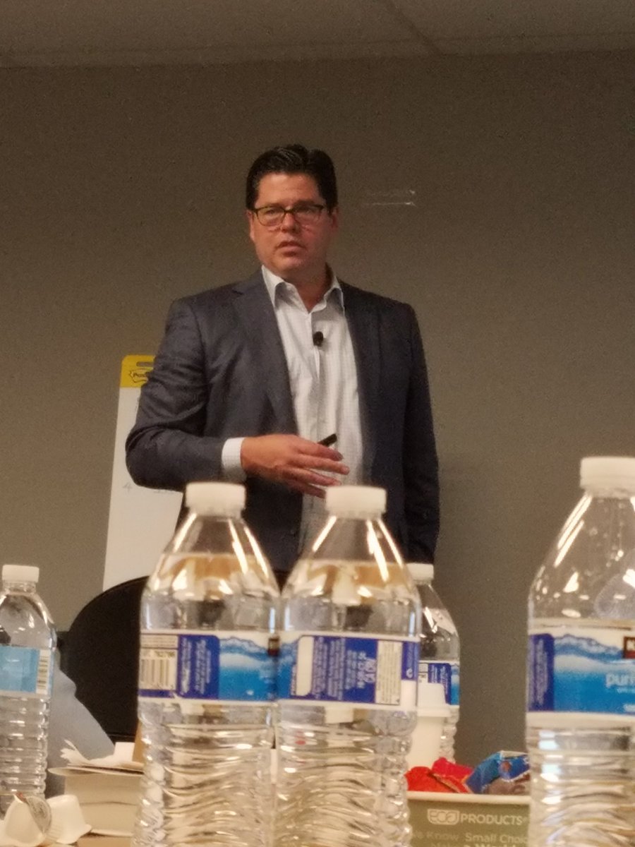 DougCahoon's tweet photo. @MichaelWing23  MIT New Hire - Wing "offends" the only guy from Utah in the room. 😀 #GetModern https://t.co/6reP116sYS