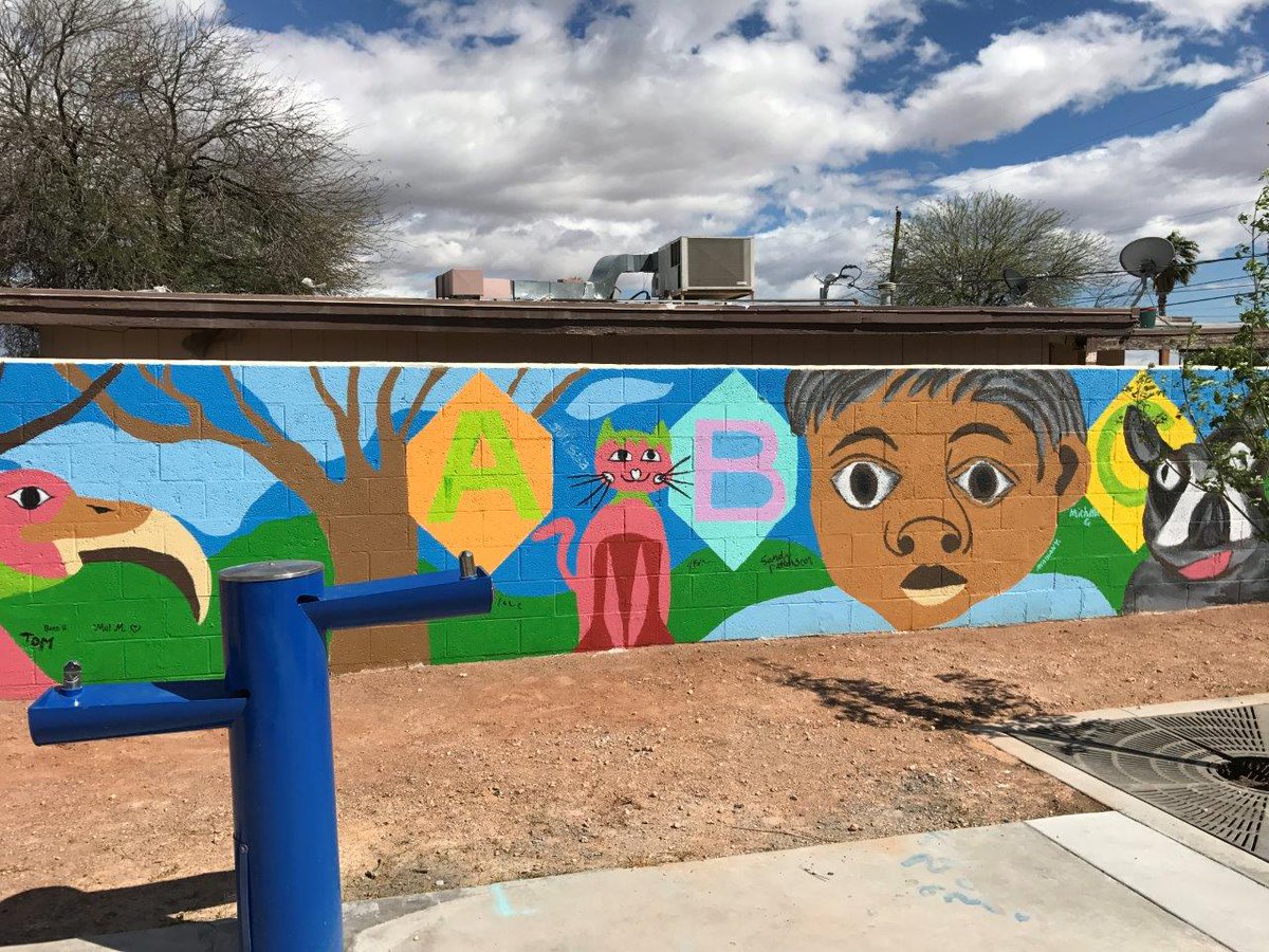 NomadeFI's tweet photo. Have you seen the cool mural .@WellsFargo team members recently painted at Brooks Tot Lot in @CNLV? #LifttheBlock #WFNevadaCares #volunteer https://t.co/ojF6QEMRTh