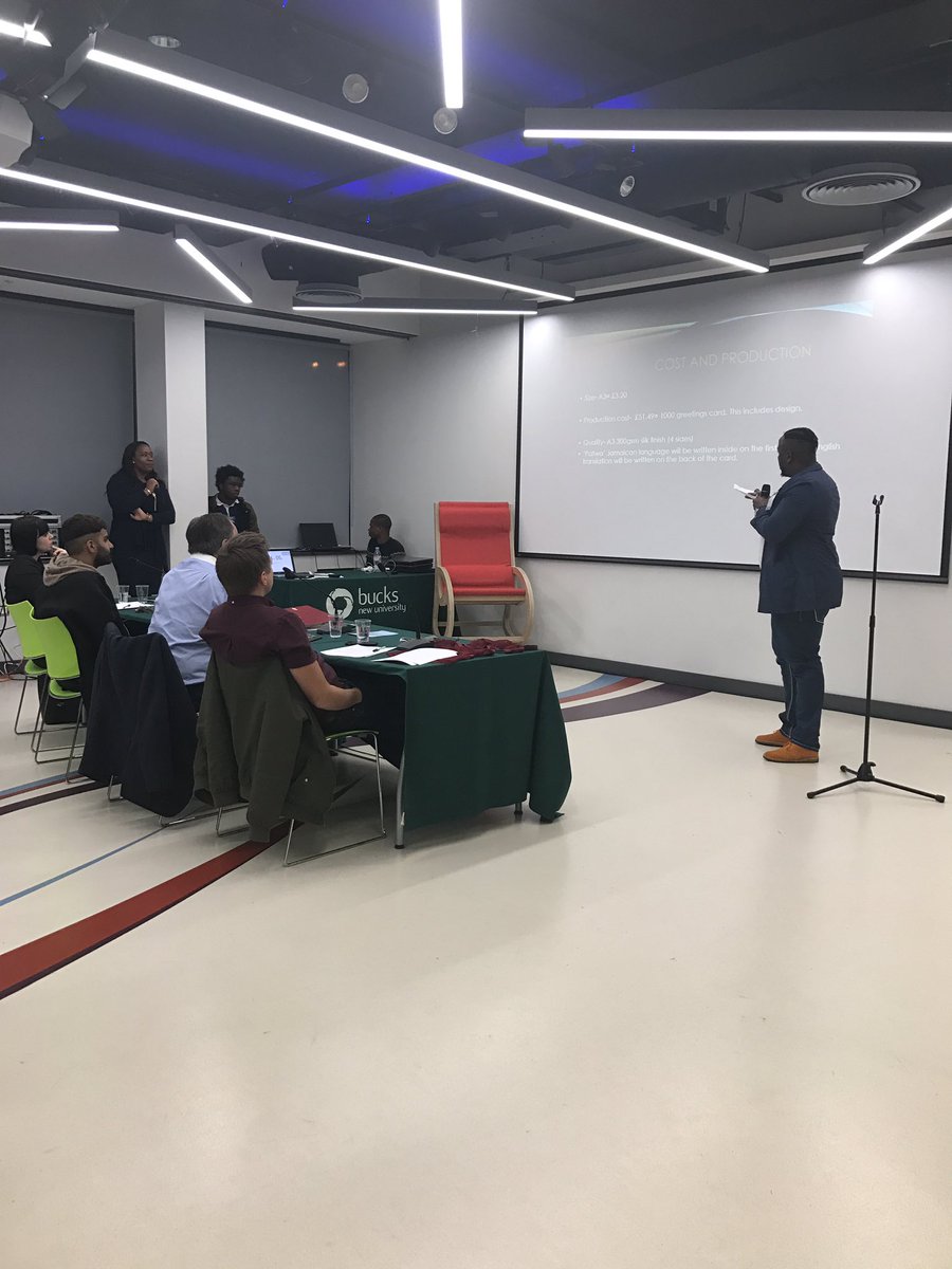 Welcome to the stage Kenroy, who is pitching <a href="/si_wi_yah/">kenroy simpson</a>, a unique card company written in Jamaican dialect! @BucksNewUni