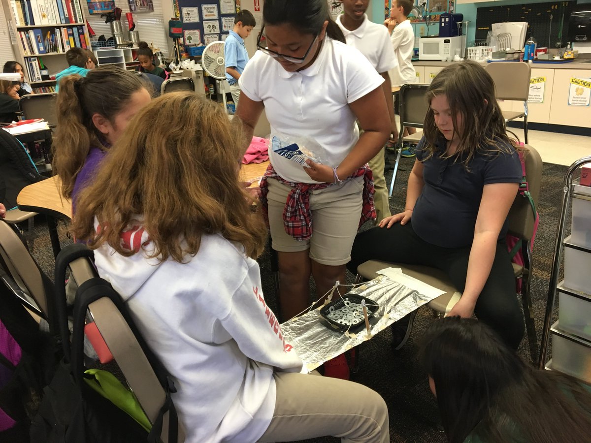 BallardSTEMtchr's tweet photo. #5thGraders are learning to calculate the load on their bridges, this one held 91 washers about 2g each. Total g? https://t.co/q2L5PhdHlI