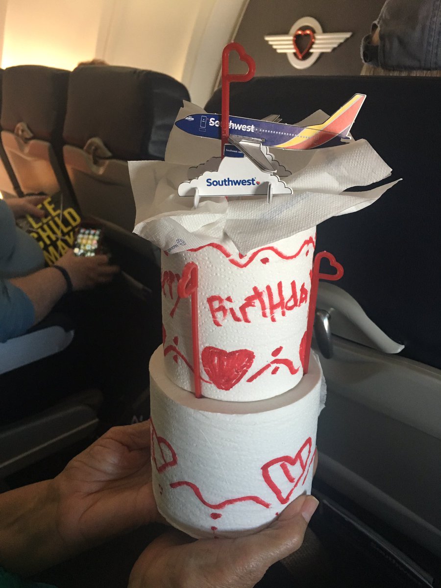ky_pat's tweet photo. Just witnessed an entire @SouthwestAir plane sing happy birthday to a 90 yo lady. Flight attendants made her a bag crown &amp; tp cake. https://t.co/fZEFhq6ClL