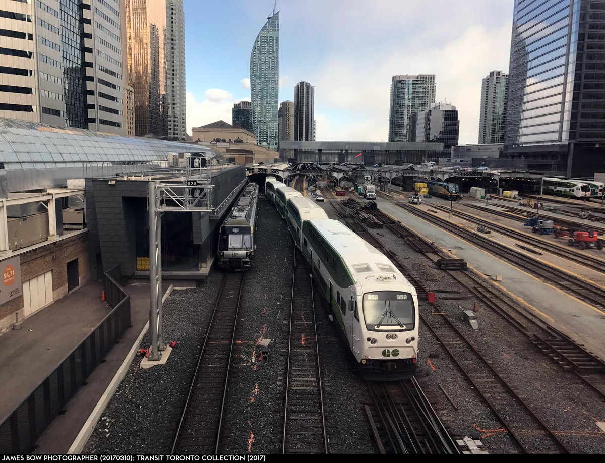 transittoronto's tweet photo. #GOTransit train and cab car 352 w/b out of #UnionStn track 4, passes #UPX train, March 10, 2017. Photo: @jamesbow https://t.co/VzxJge45pz https://t.co/JUvwLR4fGB