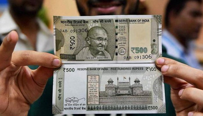 ZeeNewsEnglish's tweet image. Rupee hits 17-month high; gains past 65 vs US dollar zeenews.india.com/markets/rupee-…