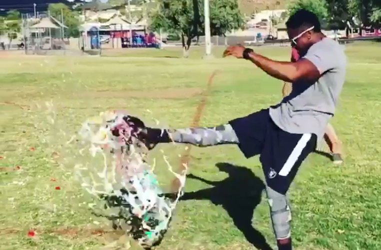 Marquette King wishes Derek Carr happy birthday by punting a cake 