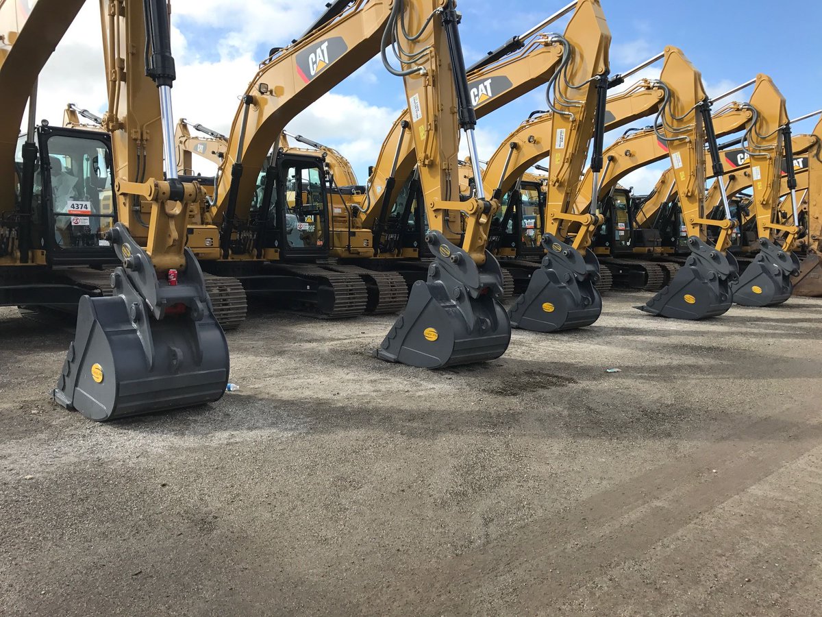 Spotted on a recent trip to the US of A. An impressive array of CAT machines fitted with Strickland MFG S-Lock Couplers and buckets.