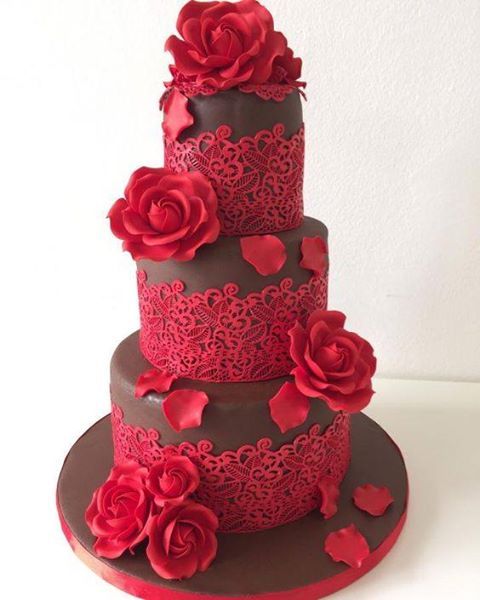 Wedding cake with three favorites - chocolate, red roses and lace!