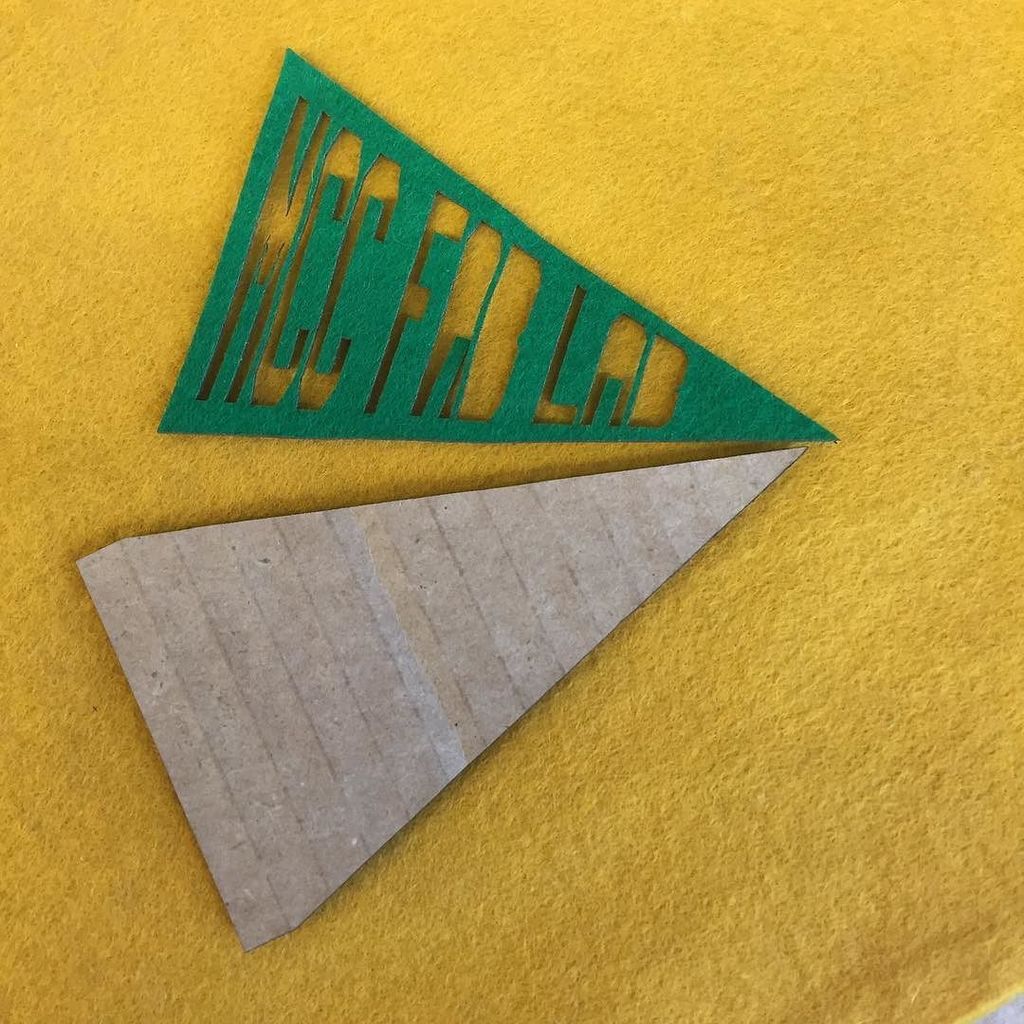 jocolibrary's tweet photo. Felt and cardboard maker pennants in the works. #makermap #jocomakes https://t.co/CwYae0uaEb